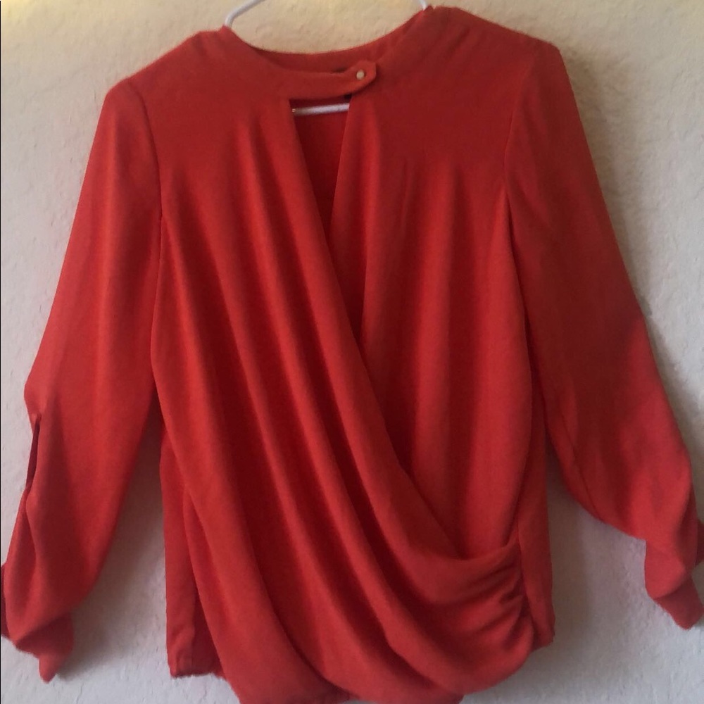 a red elegant blouse
